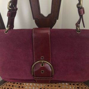 Faux suede Coach winter plum purse.